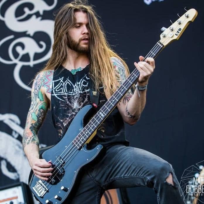 Carl Parnell on stage with his bass